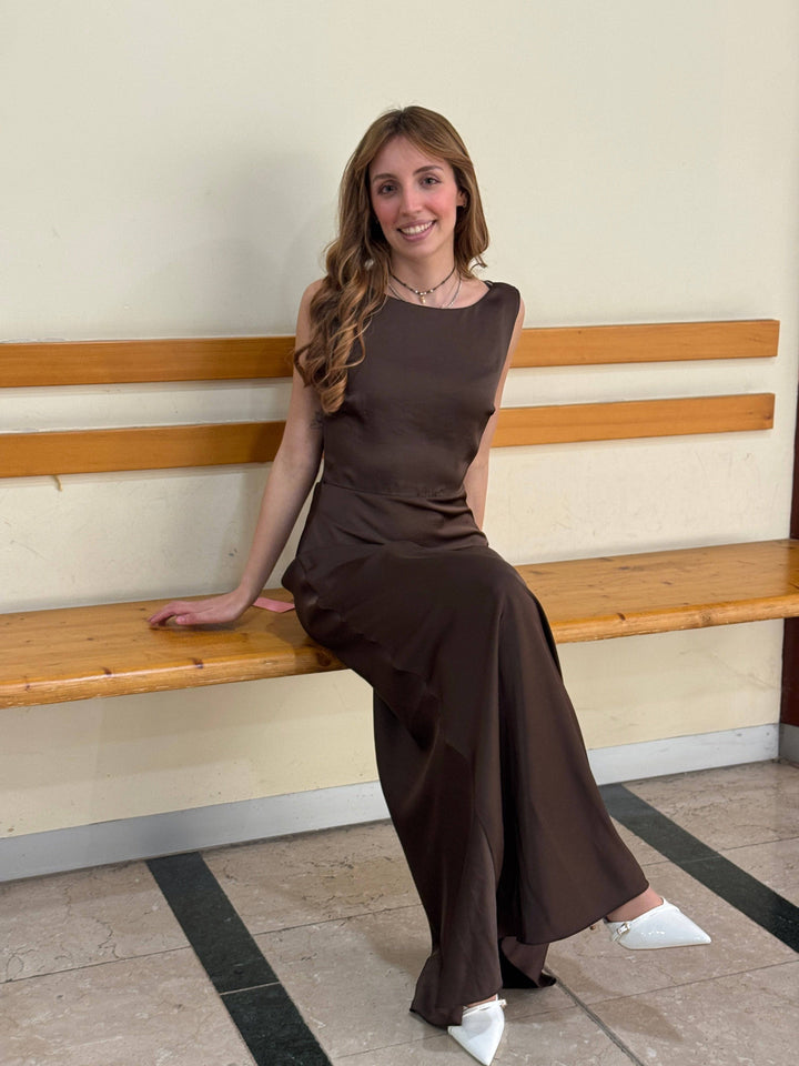 Backless Karla™ long dress by Emma & Rose Cape Town, elegant ceremony gown with flowing fabric and sophisticated design.