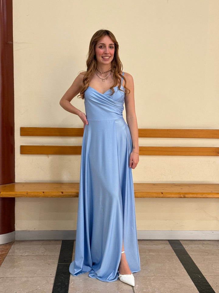 Elegant long dress by Emma & Rose Cape Town featuring a stylish neckline, perfect for formal occasions.