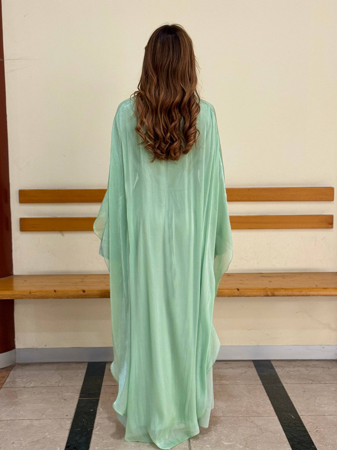 Elegant Mieke™ long dress cape by Emma & Rose Cape Town, featuring flowing fabric and intricate detailing for formal occasions.