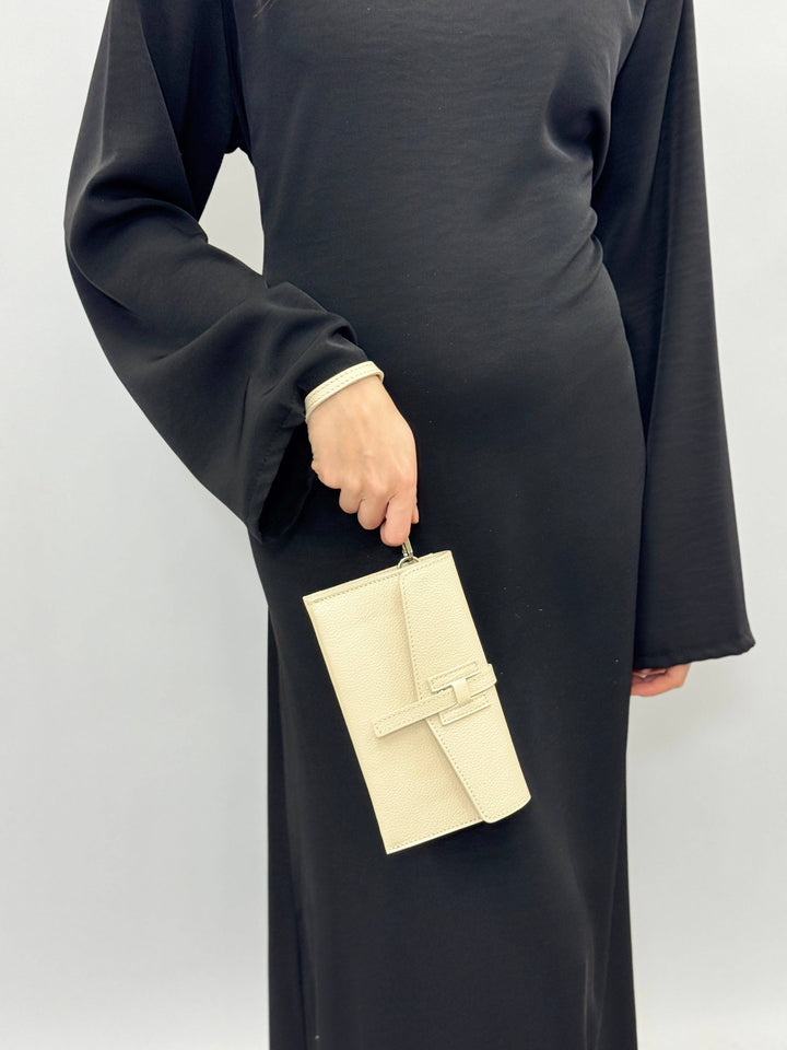 Leather clutch bag strap by Emma & Rose Cape Town, Yael™, showcasing its elegant design and high-quality leather material.