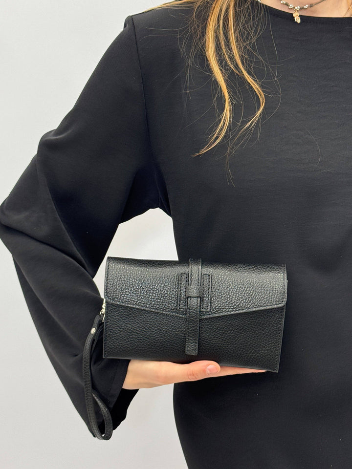 Emma & Rose Cape Town Yael leather clutch bag strap with adjustable design and premium leather finish.