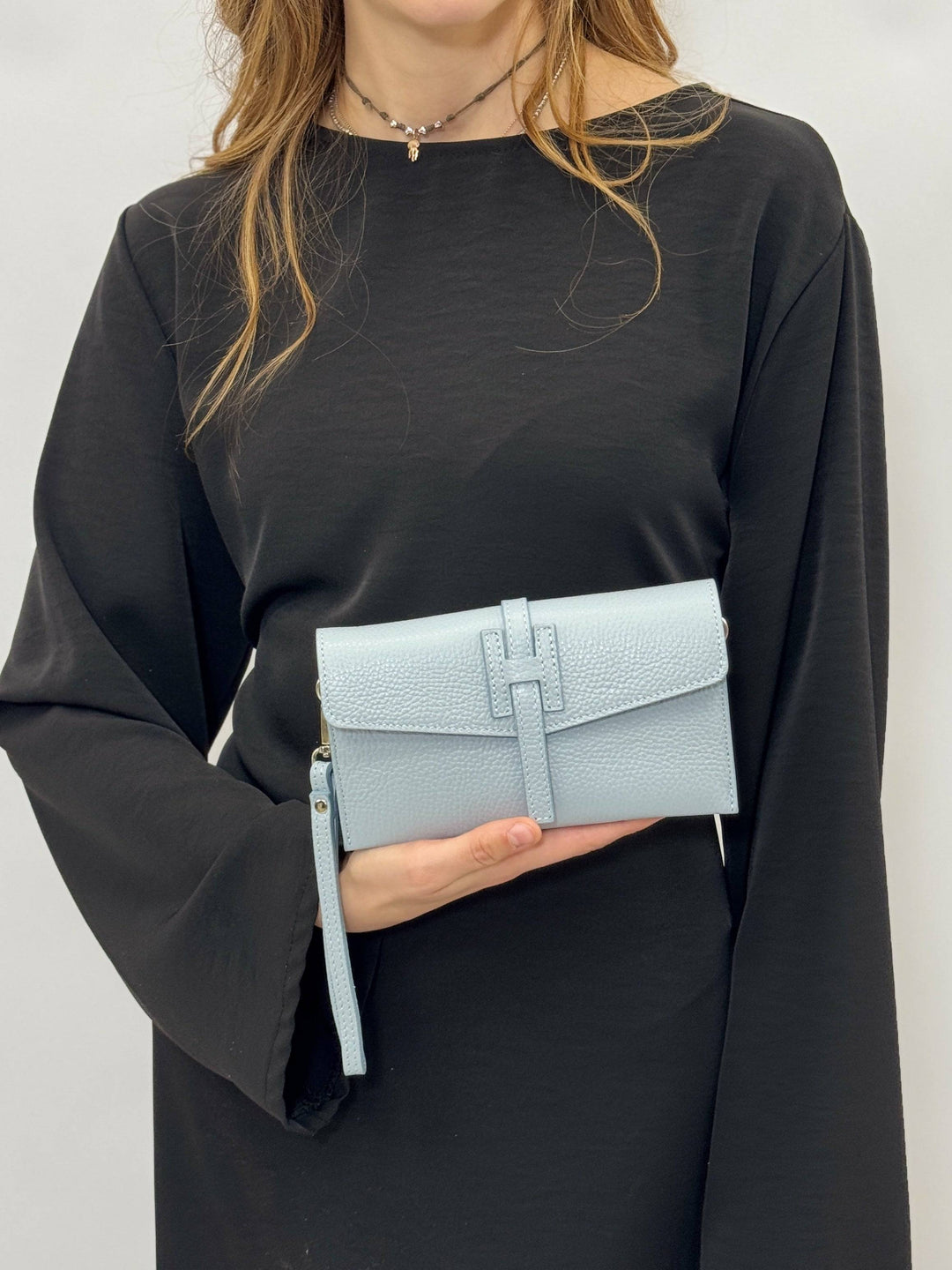 Emma & Rose Cape Town Yael™ leather clutch bag strap, stylish and durable accessory in rich leather with metal clasps.