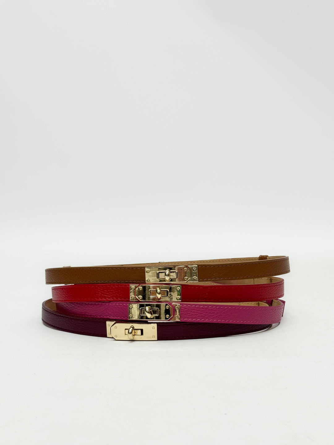 Emma & Rose Cape Town Kees™ genuine leather belt buckle accessory with intricate metal detailing on a leather strap.