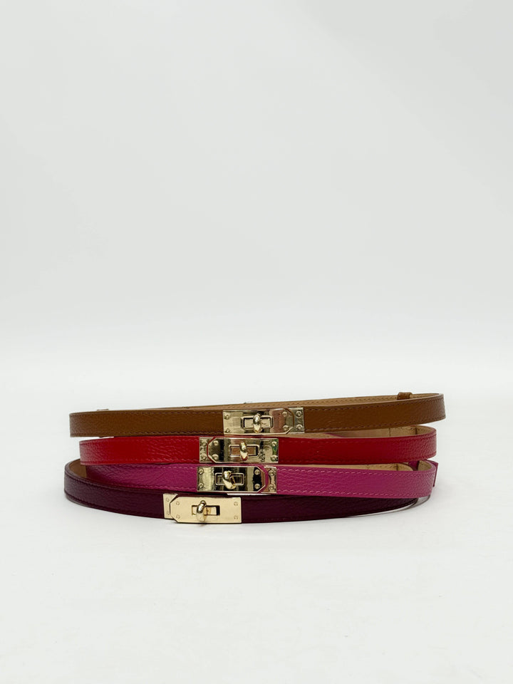 Emma & Rose Cape Town Kees™ genuine leather belt buckle accessory with intricate metal detailing on a leather strap.