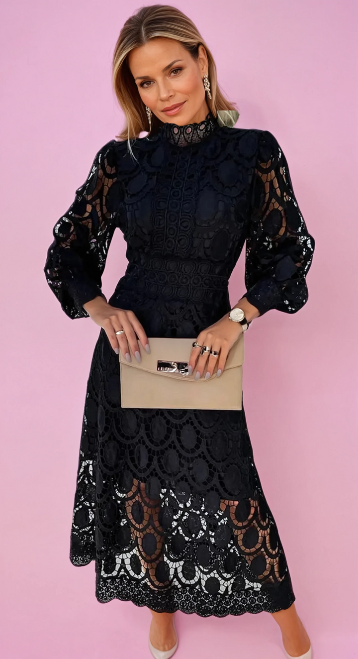 Elegant lace dress with high collar and transparent details