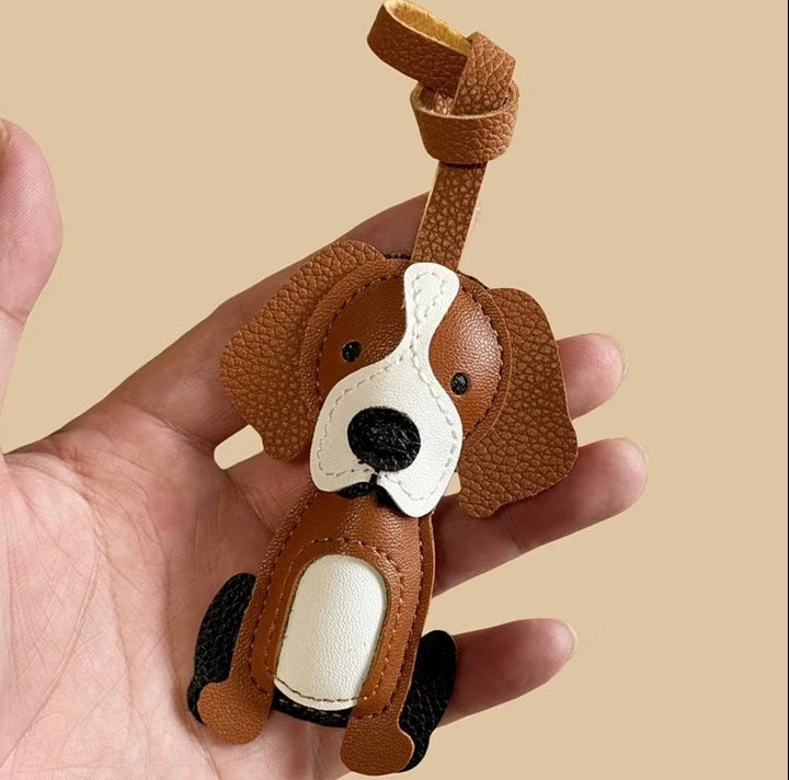 Beagle-shaped bag charm by Emma & Rose Cape Town, Tamsin™, hanging from a handbag with detailed beagle design.