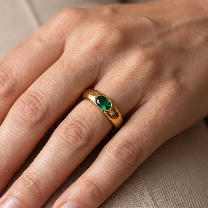 Elegant Ring with Green Accent - Elena Harper