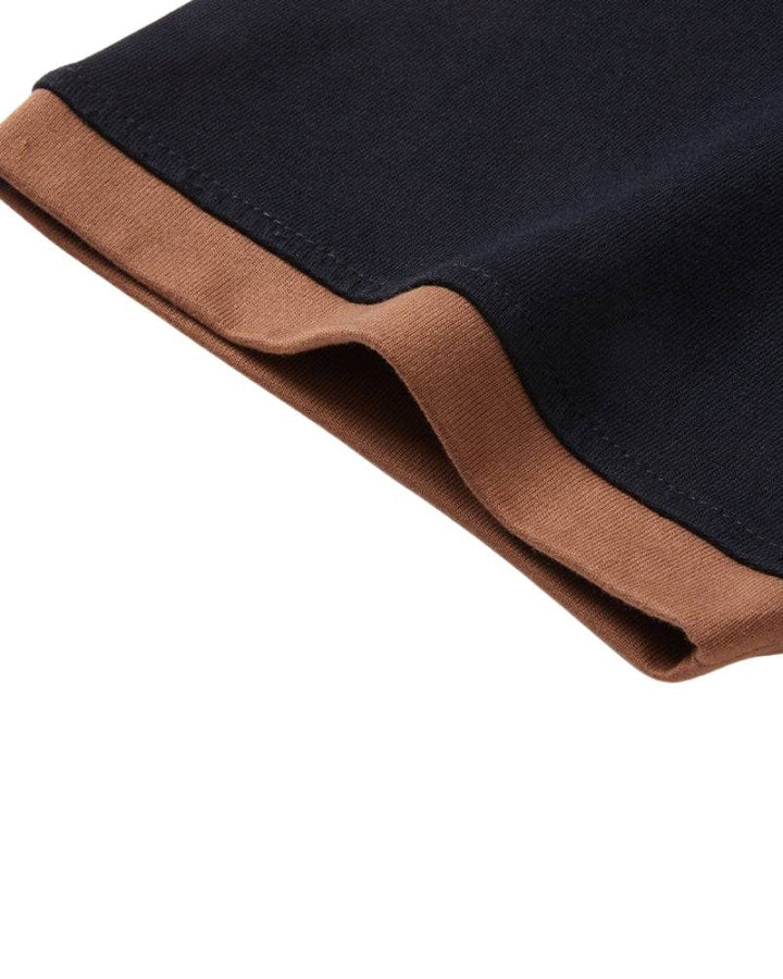 Emma & Rose Manhattan Klaas™ Como Knit Polo T-shirt in classic knit fabric, featuring a structured collar and short sleeves.