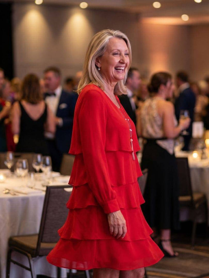 Layered knee-length dress by Emma & Rose Cape Town featuring a stylish design and comfortable fit, shown in Kirax_3.jpg.