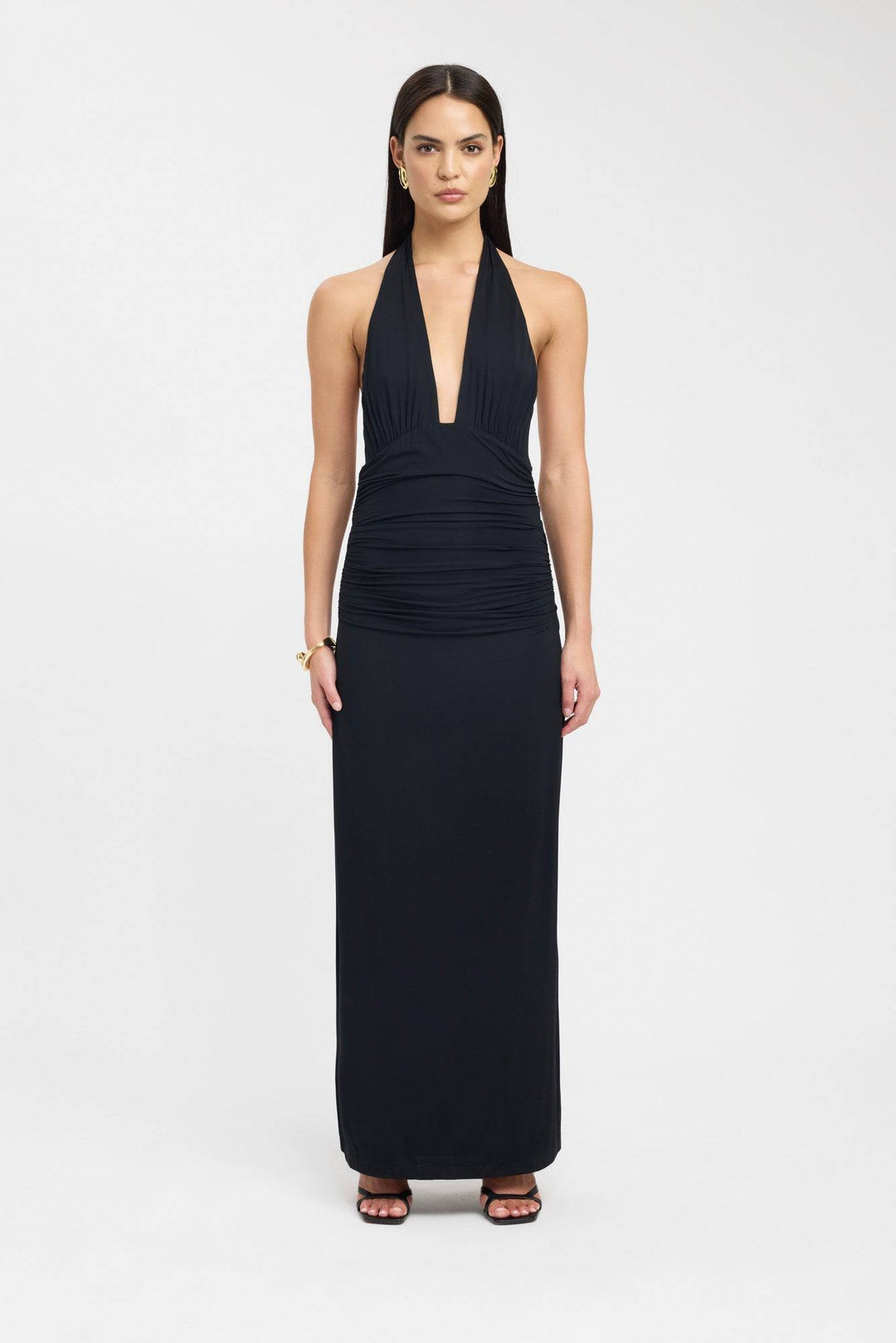 Black Serenya™ elegant maxi dress by Emma & Rose Cape Town, flowing fabric with a fitted bodice and full-length skirt.