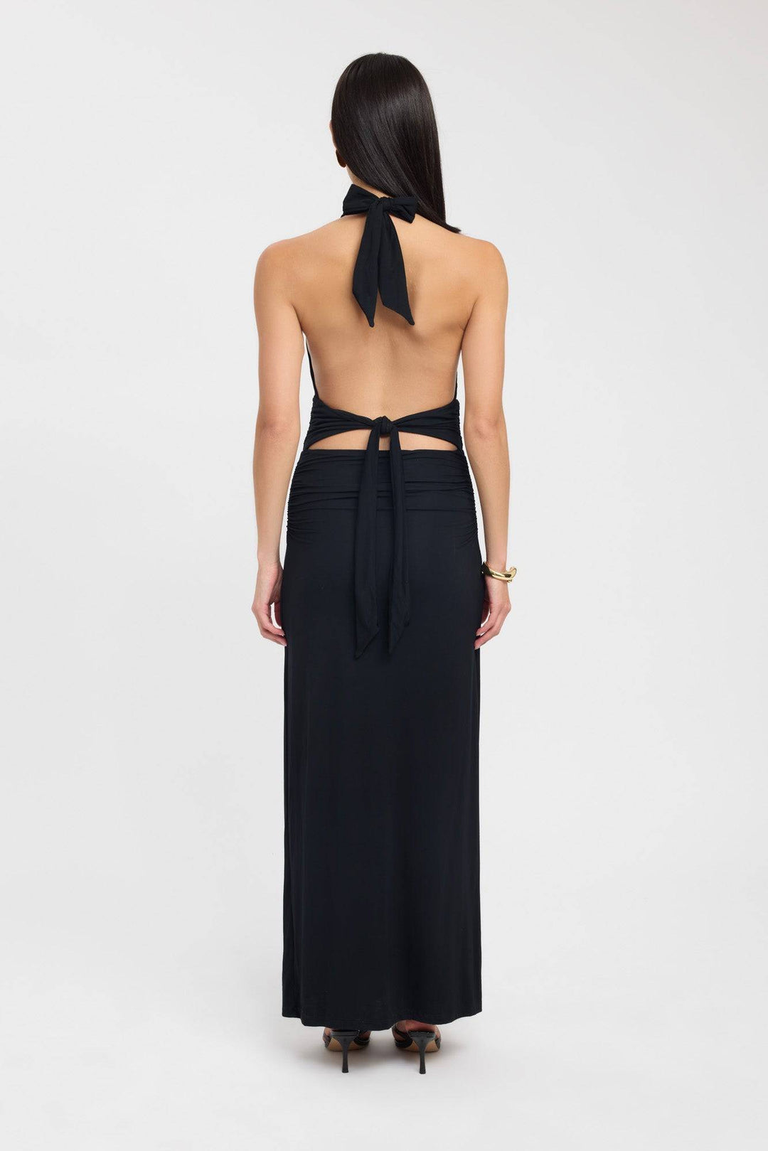 Black Serenya™ elegant maxi dress by Emma & Rose Cape Town, flowing fabric and fitted waist, worn by a model.