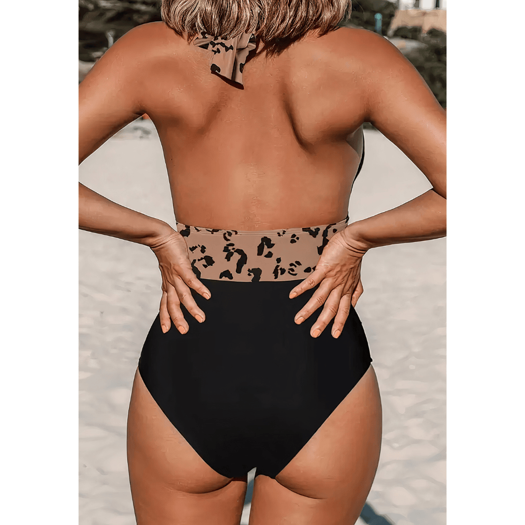 Pink Jacoba Luxe Aura Swimsuit by Emma & Rose Manhattan, featuring sleek design and vibrant color, perfect for beach or poolside.