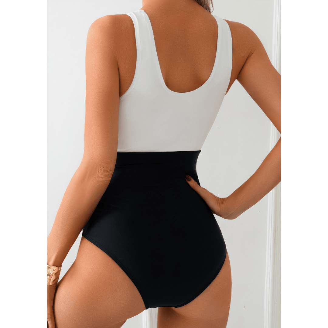 Emma & Rose Manhattan Shades™ Elegance Swimsuit in LagunaWave Dress features vibrant colorful patterns and a stylish fit.