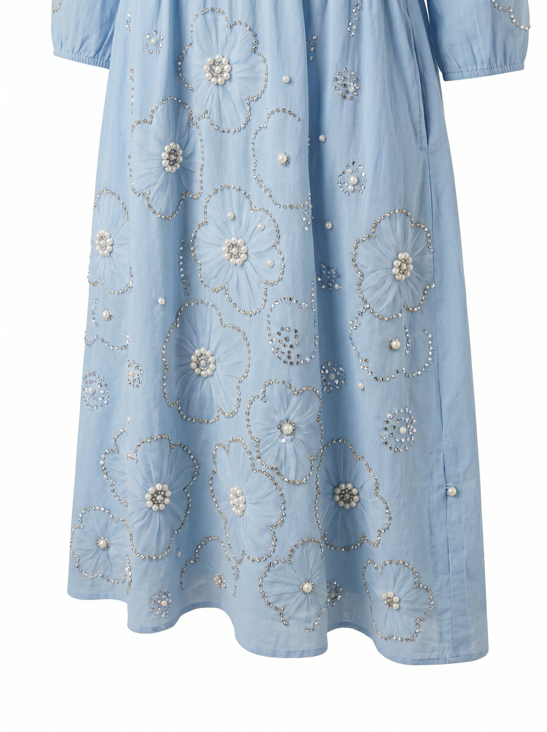 Emma & Rose Cape Town Lena floral midi dress displayed on a hanger with vibrant floral patterns and flowing fabric.