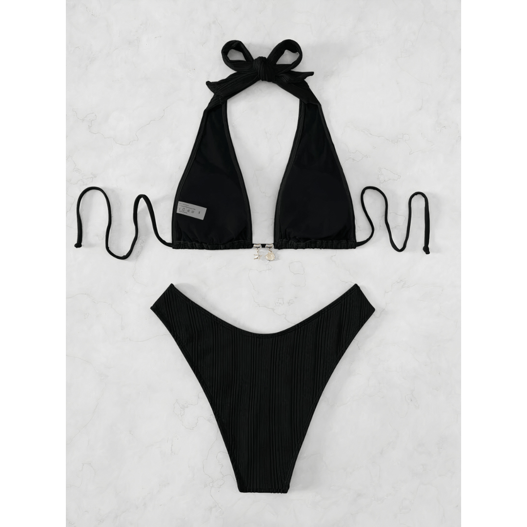 Sapphire Stripe Bikini by Emma & Rose Manhattan featuring a vibrant blue and white striped pattern on a stylish swimwear top and bottom.