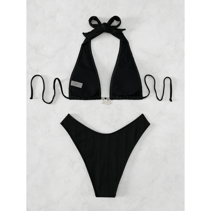 Sapphire Stripe Bikini by Emma & Rose Manhattan featuring a vibrant blue and white striped pattern on a stylish swimwear top and bottom.