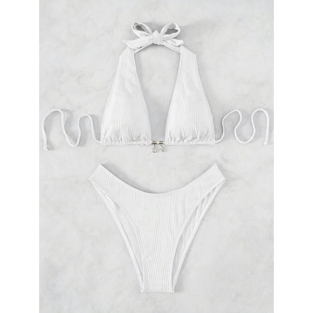 Sapphire Stripe Bikini by Emma & Rose Manhattan featuring a vibrant blue and white striped bikini top and bottom.