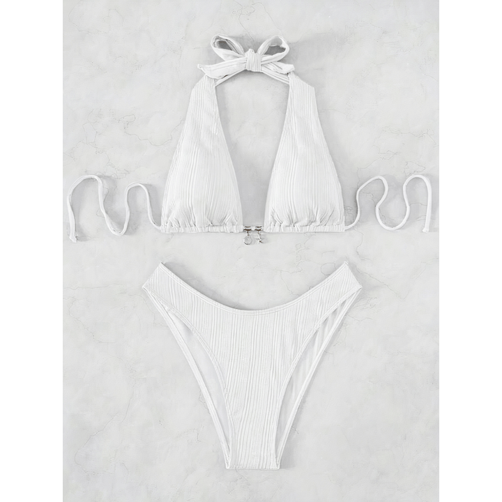 Sapphire Stripe Bikini by Emma & Rose Manhattan featuring a vibrant blue and white striped bikini top and bottom.