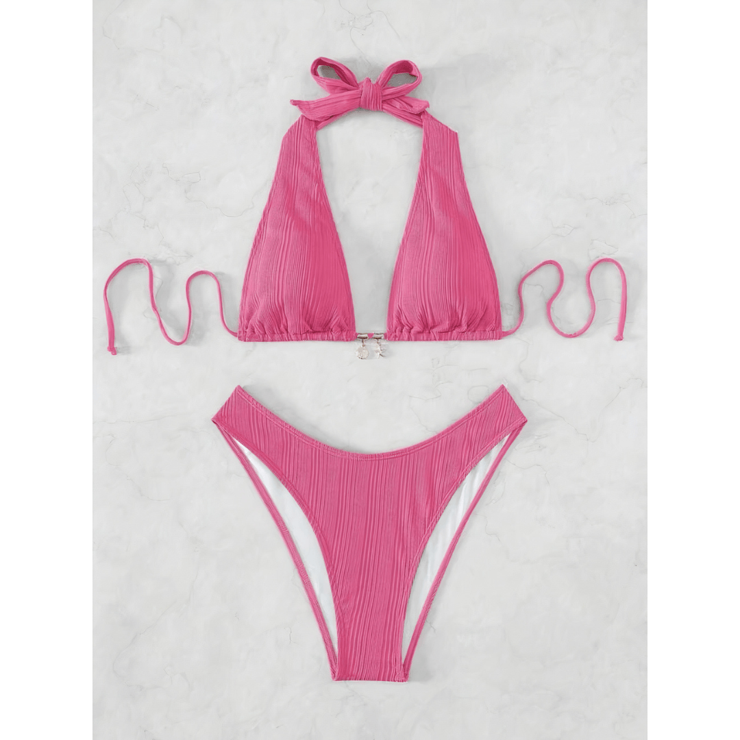 Sapphire Stripe Bikini by Emma & Rose Manhattan featuring a luminous, patterned bikini top and bottom with vibrant blue and white stripes.
