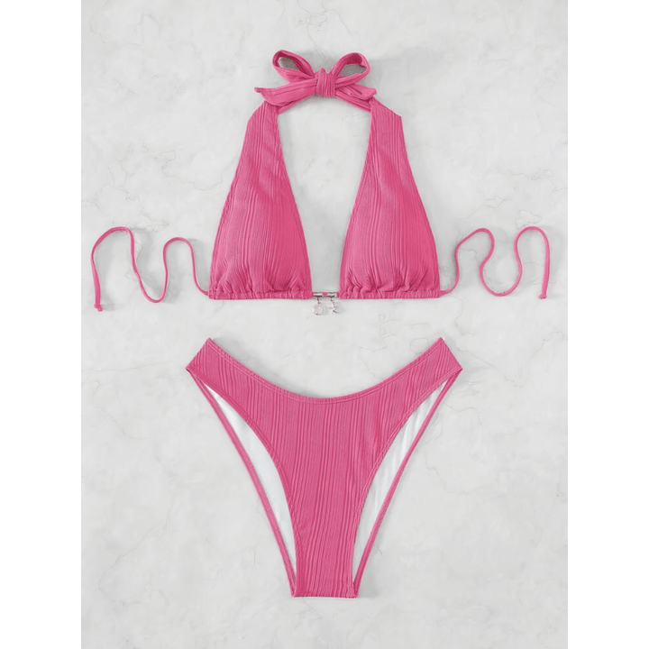 Sapphire Stripe Bikini by Emma & Rose Manhattan featuring a luminous, patterned bikini top and bottom with vibrant blue and white stripes.