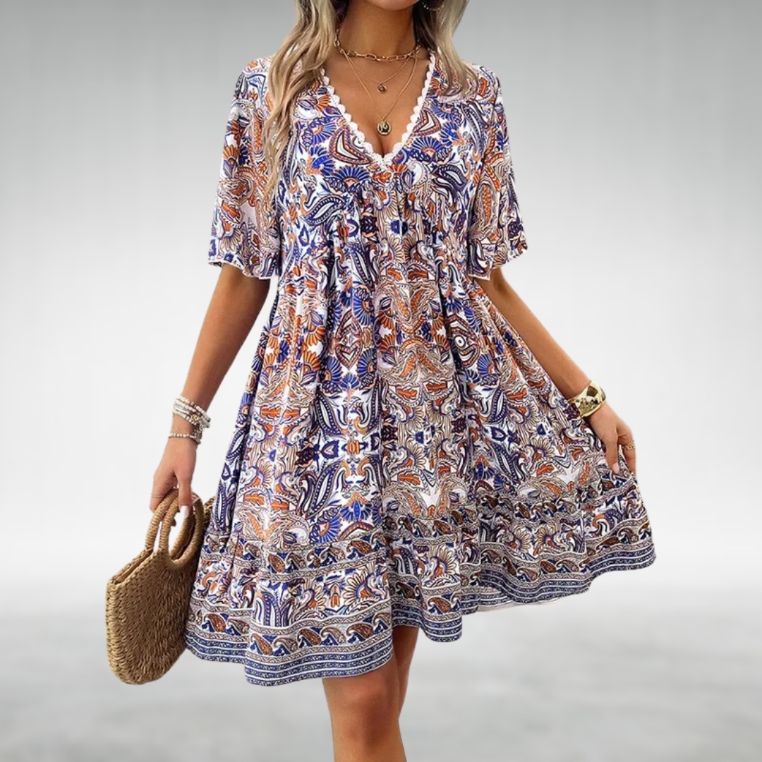 Short Boho-style dress with V-neck and ethnic pattern