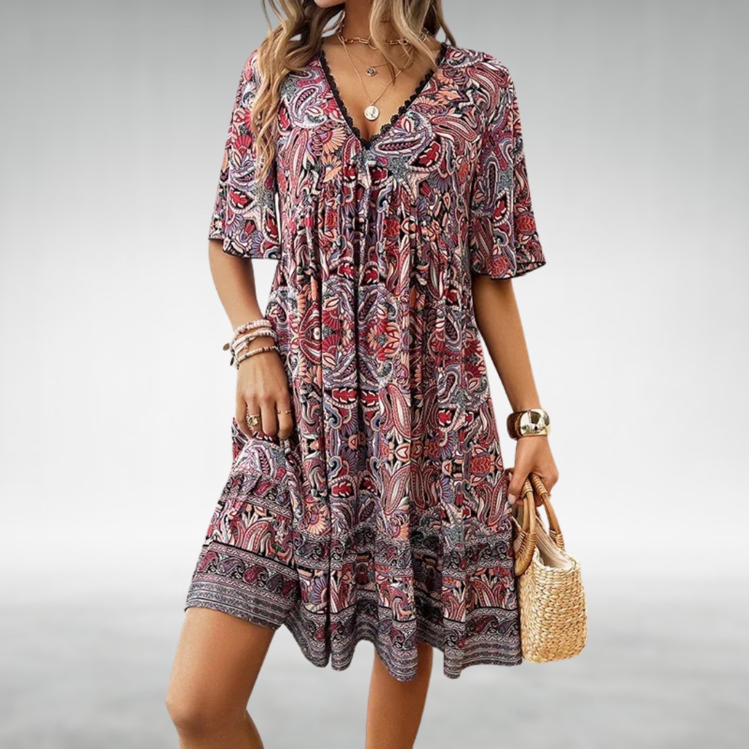 Short Boho-style dress with V-neck and ethnic pattern