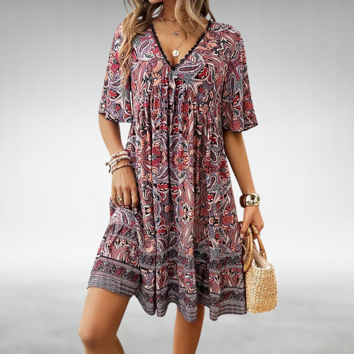 Short Boho-style dress with V-neck and ethnic pattern