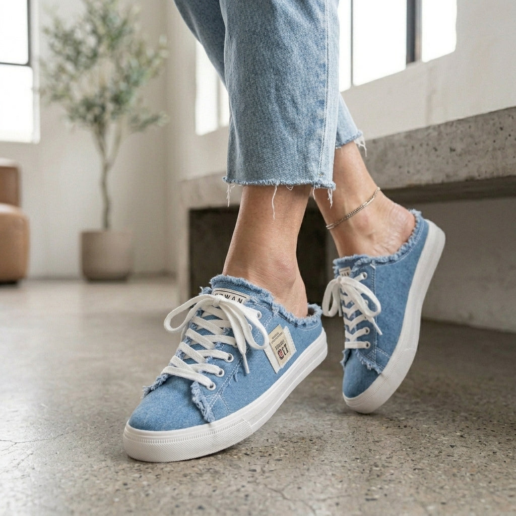 Emma & Rose Cape Town cowboy mule slippers worn by a model, showcasing stylish and comfortable footwear with a western-inspired design.
