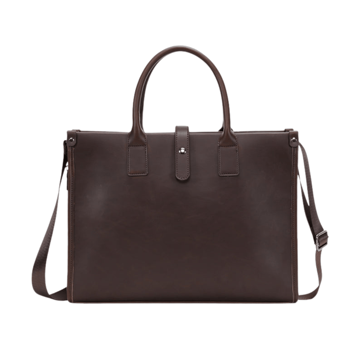 Emma & Rose Manhattan Roger™ business case with sleek black leather exterior and sturdy handle for professional travel.