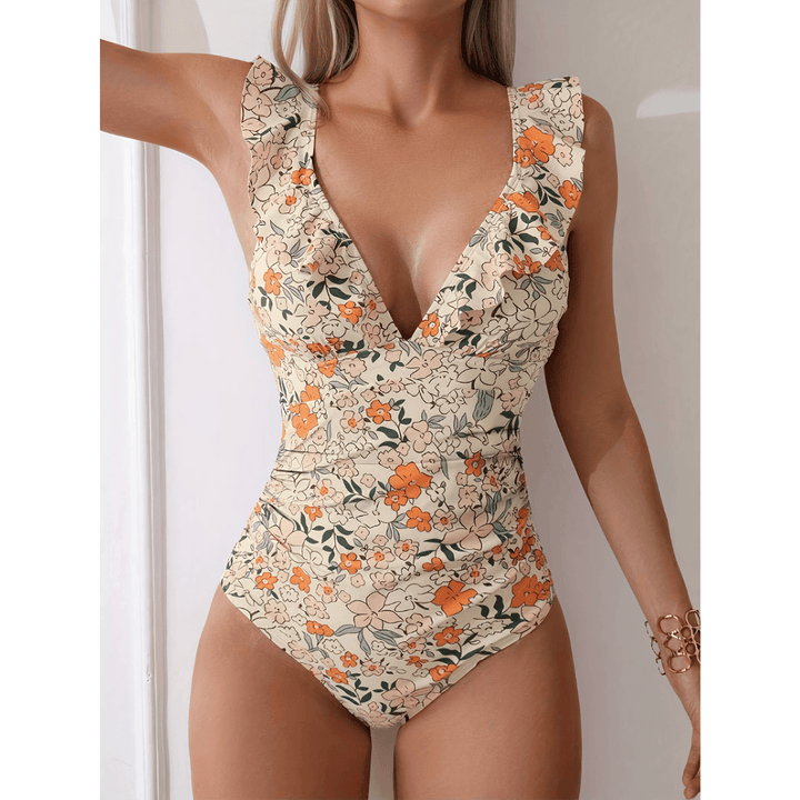 Florence™ Flair Swimsuit by Emma & Rose Manhattan featuring a stylish one-piece design with vibrant patterns.