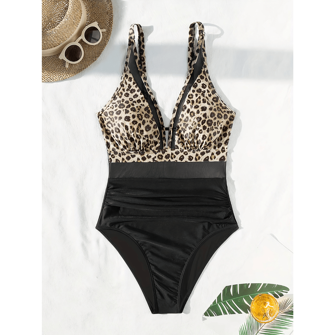 Emma & Rose Manhattan Johanna Crystal Cove Swimsuit shown in the image, featuring a stylish one-piece design with vibrant patterns.