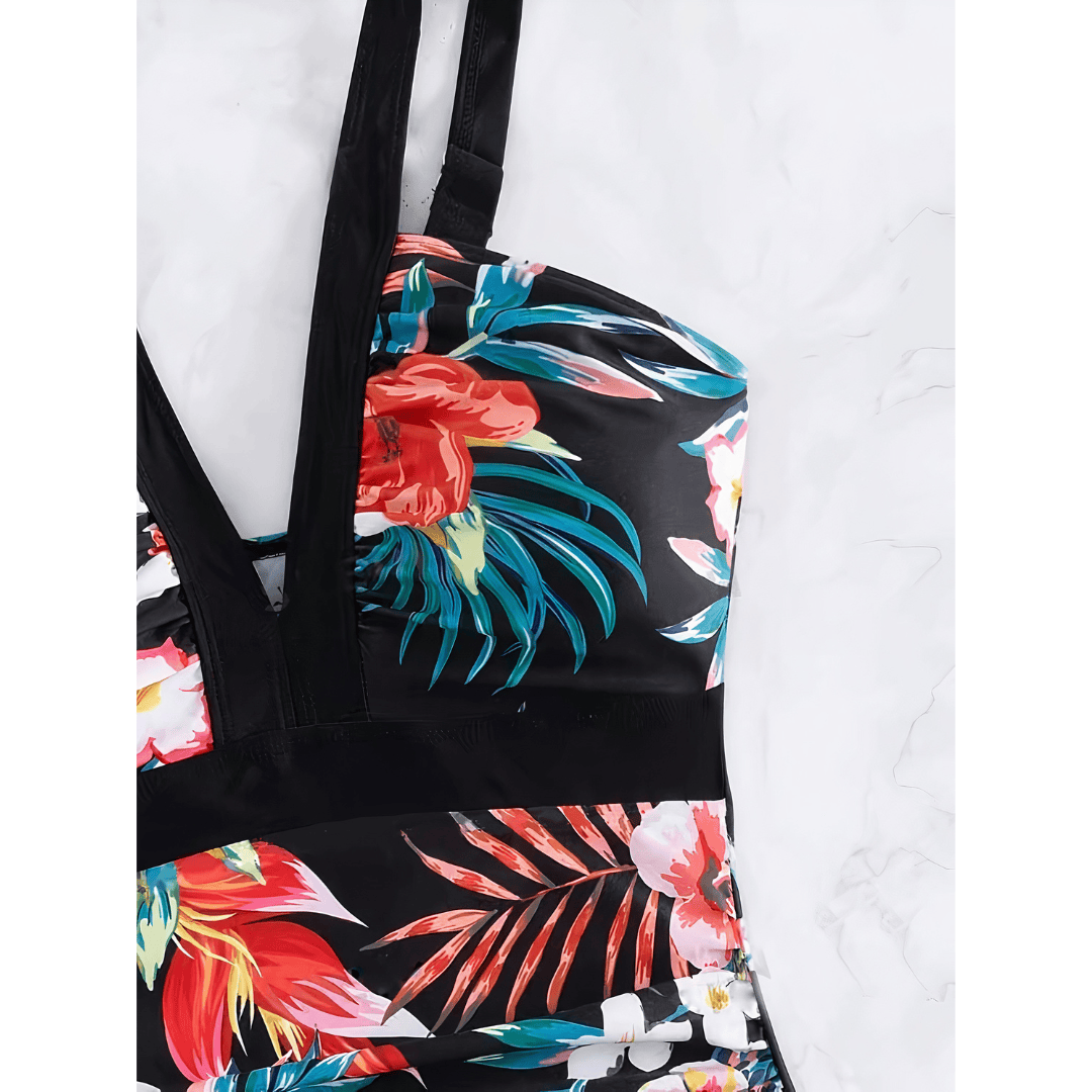Emma & Rose Manhattan Lize Blossom Royale Swimsuit featuring floral print and sleek design, displayed on a mannequin.