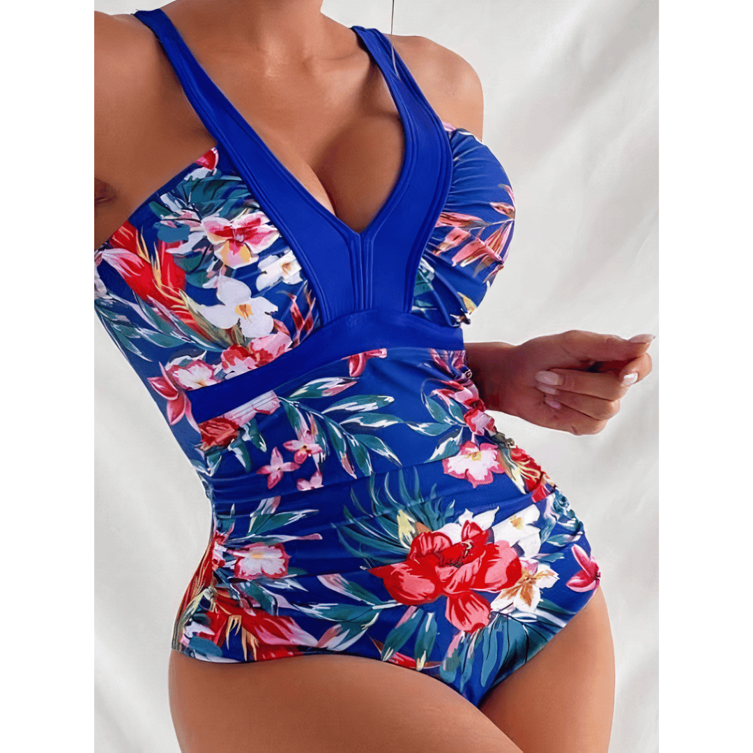 Lize™ Blossom Royale Swimsuit by Emma & Rose Manhattan featuring vibrant floral pattern and fitted design on a model.