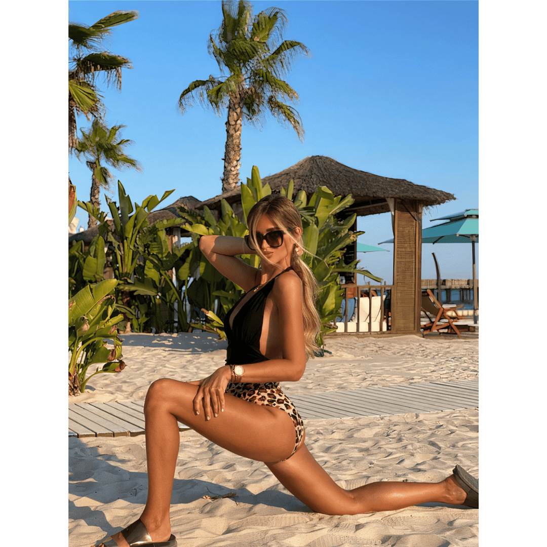 Leopard swimsuit by Emma & Rose Manhattan, Vogue™ collection, featuring a stylish one-piece with bold animal print and cut-out details.