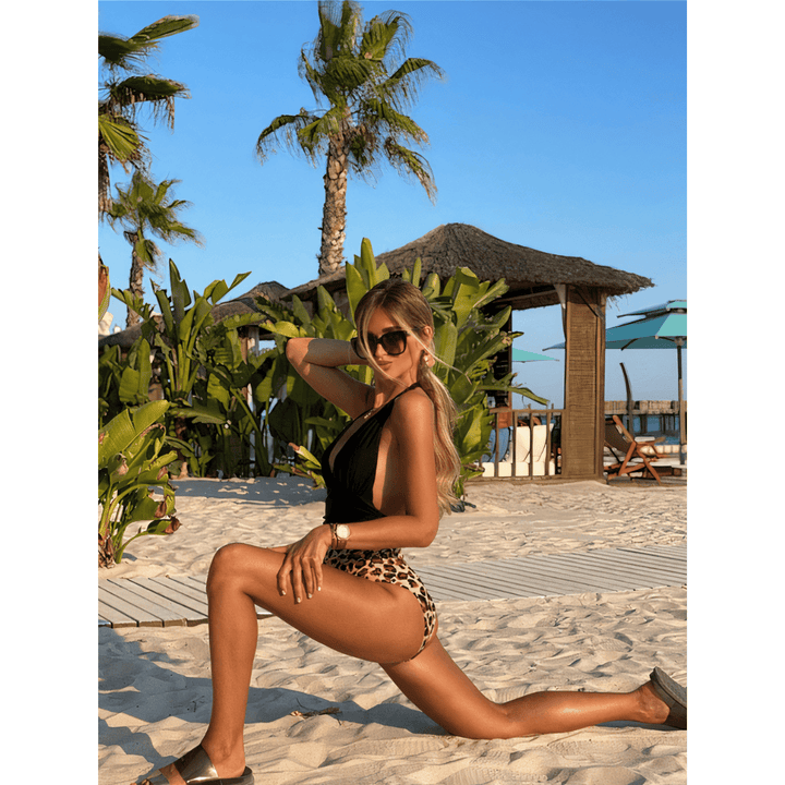 Leopard swimsuit by Emma & Rose Manhattan, Vogue™ collection, featuring a stylish one-piece with bold animal print and cut-out details.