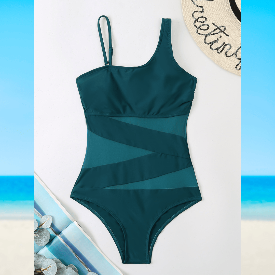 Sunset™ Elegance Swimsuit by Emma & Rose Manhattan displayed on a mannequin with a stylish cut and vibrant sunset pattern.
