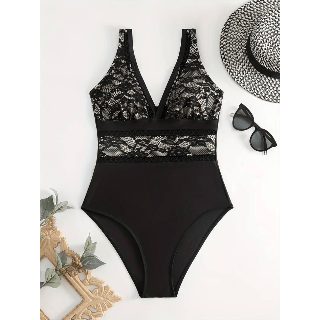 Midnight™ Glamour Swimsuit by Emma & Rose Manhattan, featuring a sleek black design and stylish cut for beach or pool.