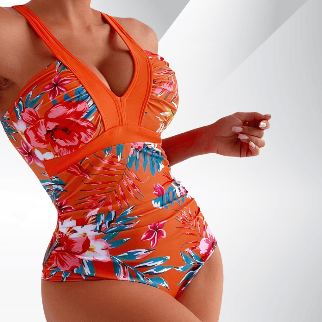 Emma & Rose Manhattan Lize Blossom Royale swimsuit with floral print, featuring a vibrant, stylish design perfect for beach or pool.