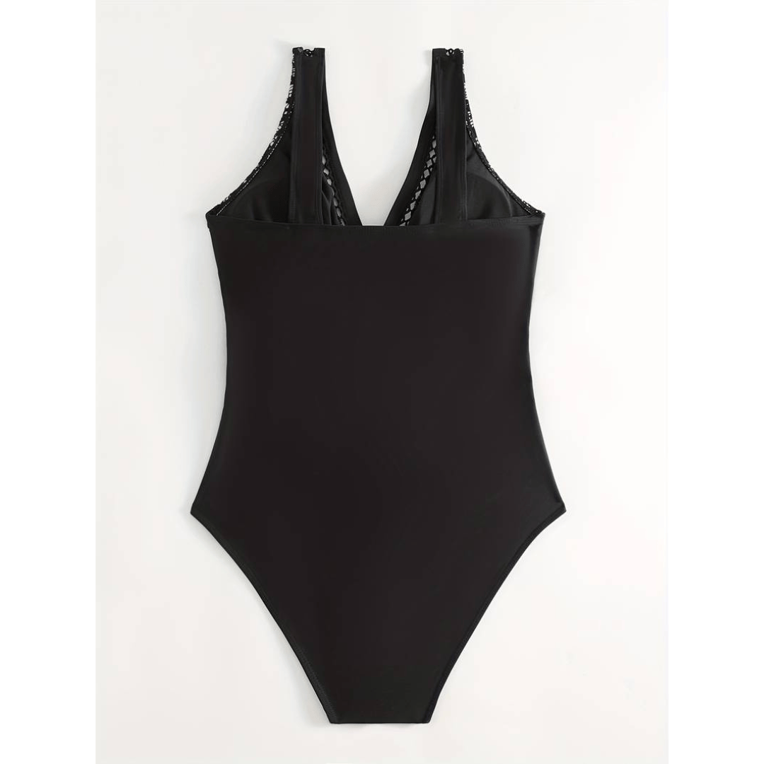 Midnight™ Glamour Swimsuit by Emma & Rose Manhattan, featuring sleek black fabric and stylish design on a model.