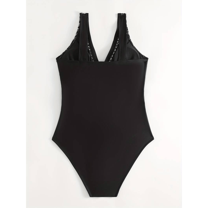 Midnight™ Glamour Swimsuit by Emma & Rose Manhattan, featuring sleek black fabric and stylish design on a model.