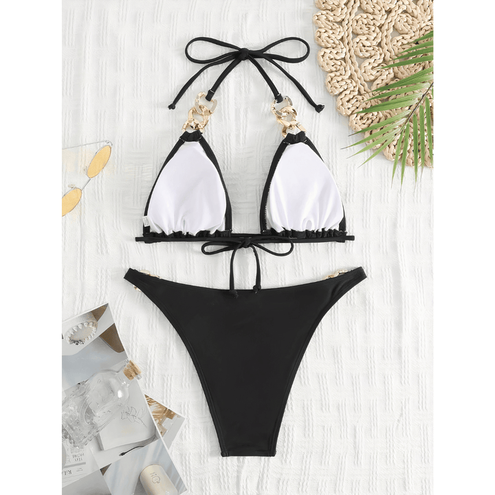 Emma & Rose Manhattan Imke™ Golden Glamour Triangle Bikini top with gold accents, showcasing a stylish swimwear design on a model.