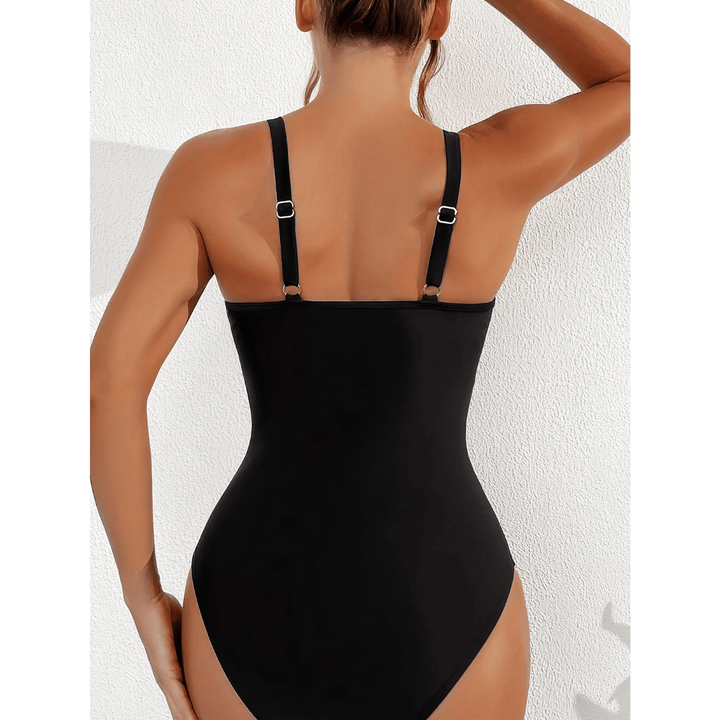Emma & Rose Manhattan Johanna™ Crystal Cove swimsuit featuring a stylish, patterned one-piece design with a plunging neckline.