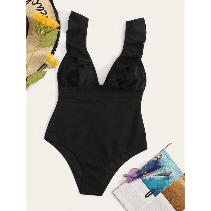 Olivia™ Mirage Swimsuit by Emma & Rose Manhattan, featuring a stylish one-piece with vibrant print and seamless fit.