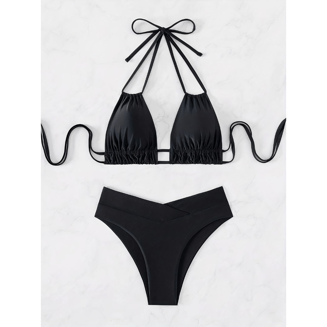 Tropic™ Charm Bikini Set by Emma & Rose Manhattan featuring a colorful bikini top and matching bottoms on a model.