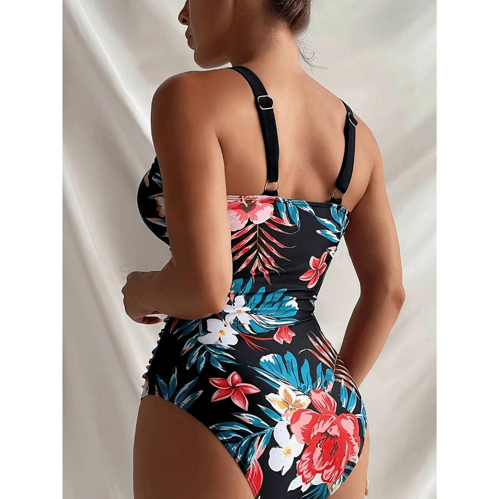 Lize™ Blossom Royale swimsuit by Emma & Rose Manhattan featuring a vibrant floral pattern and sleek, modern design.