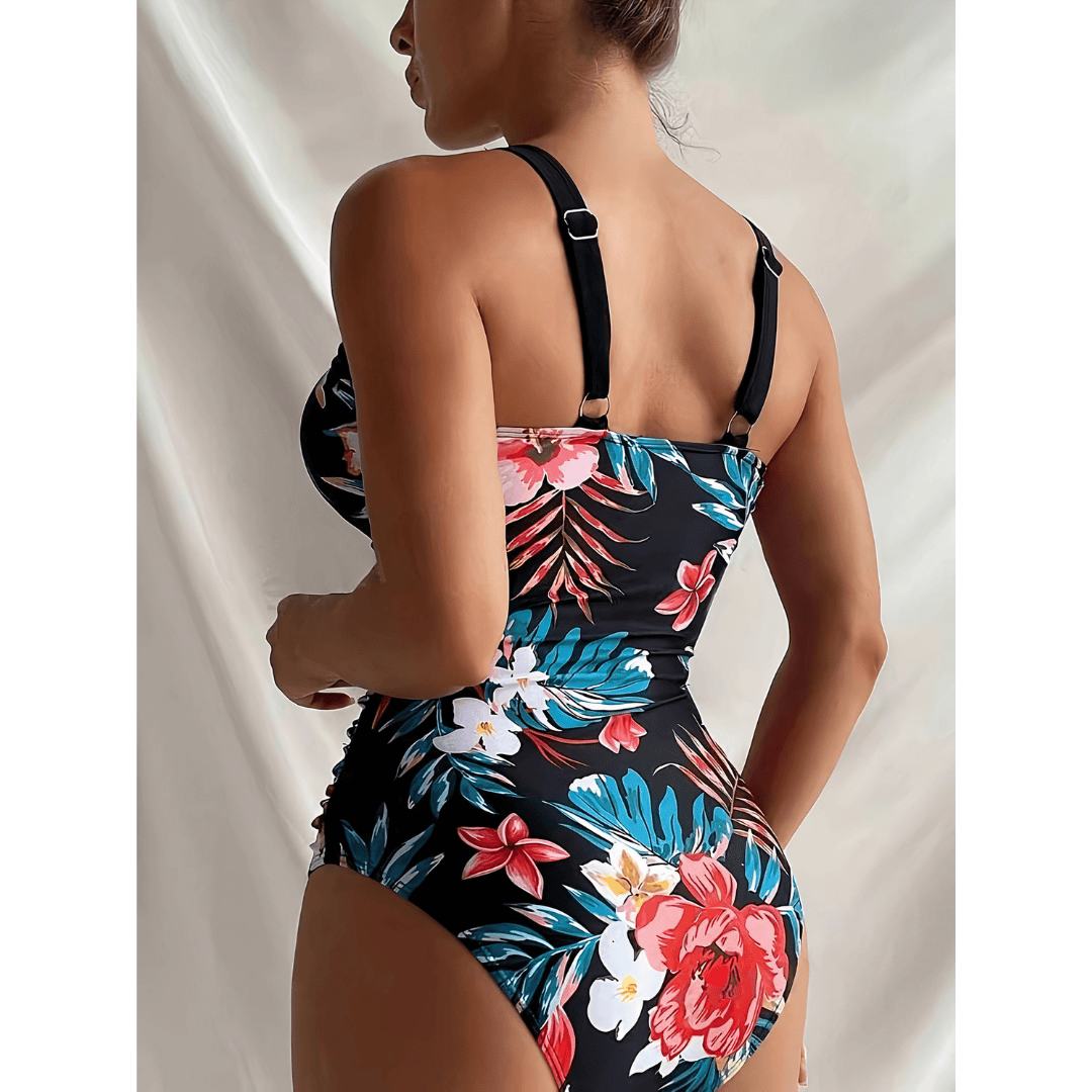 Lize™ Blossom Royale swimsuit by Emma & Rose Manhattan featuring a vibrant floral pattern and sleek, modern design.