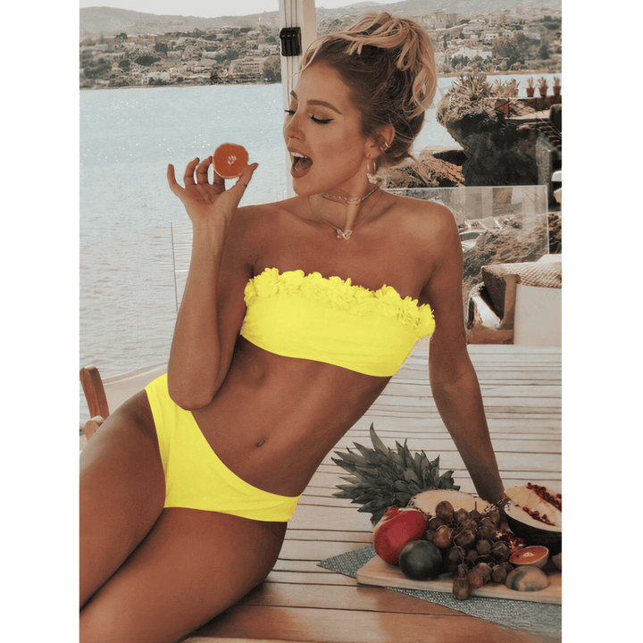 Talita BloomBreeze bikini set by Emma & Rose Manhattan, featuring colorful floral patterns and stylish bikini top and bottoms.