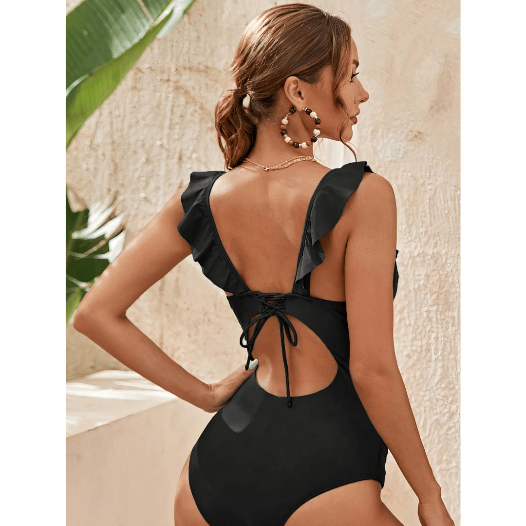 Florence™ Flair Swimsuit by Emma & Rose Manhattan featuring a stylish one-piece design with vibrant patterns and a sleek fit.