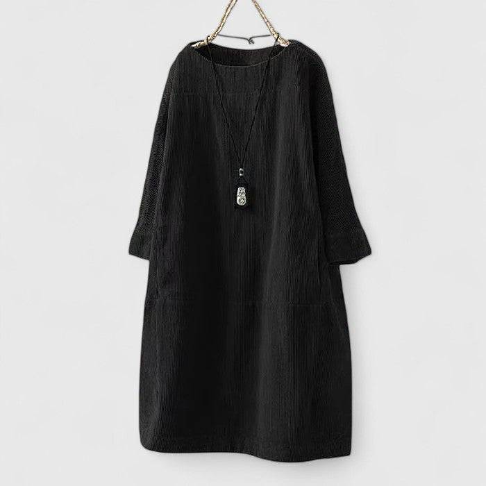 Lorra™ comfortable midi dress by Emma & Rose Cape Town featuring a relaxed fit and elegant design, shown on a model.