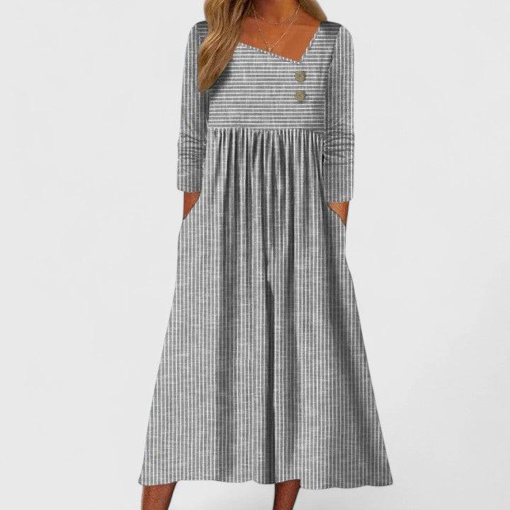 Elegant Cleomarie™ midi dress by Emma & Rose Cape Town, showcasing a stylish, flowing design with intricate details.